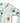 Sleeve detail of baby coverall with whimsical child holding a balloon
