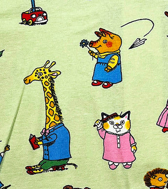 Detail of pajama fabric showing giraffe, cat, and pig characters from Busy World