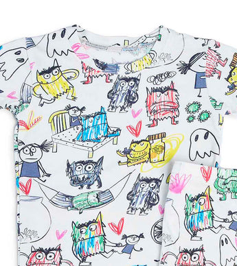 Close-up of pajama top with colorful monsters and hearts