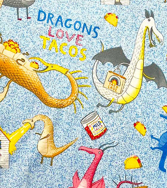 Dragons Love Tacos 2 text and dragon print on kids pajamas