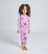 Child wearing Florabelle pajamas with playful storybook illustrations