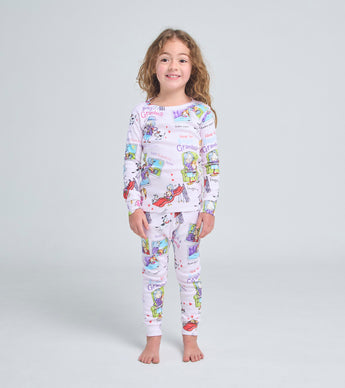 Child wearing How to Babysit a Grandma inspired pajama set with colorful story scenes