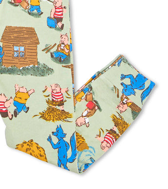 Folded pajama pants with Three Little Pigs and wolf illustrations