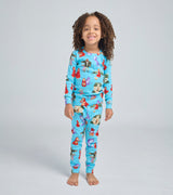Child wearing blue Little Red Riding Hood pajamas with storybook characters