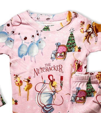 Close-up of The Nutcracker kids pajamas showing dancers and Christmas tree