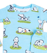 Close-up of Rocket dog print on blue kids’ pajama top
