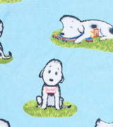 Rocket dog character close-up on blue pajama fabric