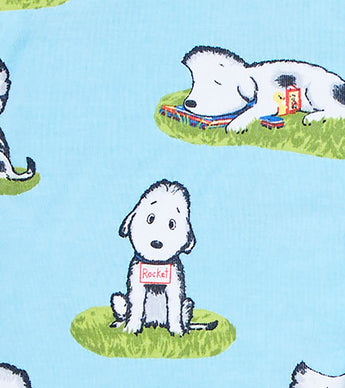 Rocket dog character close-up on blue pajama fabric