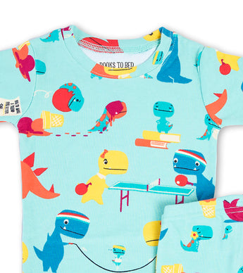 Close-up of dino print pajama top from Books to Bed