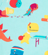 Yellow dinosaur playing ping pong on kids' pajama fabric