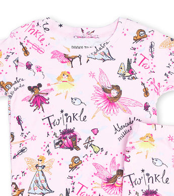 Close-up of Twinkle kids pajamas showing fairy and musical designs