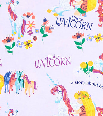 Fabric detail showing Uni the Unicorn and rainbow unicorns on pajamas