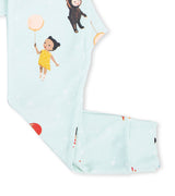 Detail of pajama leg with floating child and balloon illustration