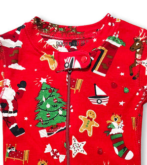 Closeup of Christmas baby coverall collar and zipper with festive holiday designs