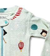 Sleeve detail of baby coverall with whimsical child holding a balloon