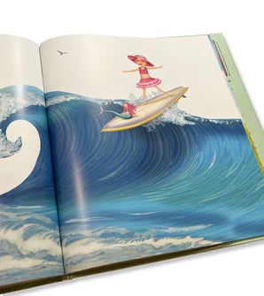 Open spread of Aqualicious book showing girl and mermaid surfing a big ocean wave