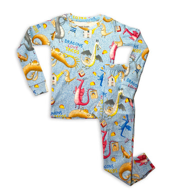 Children’s pajamas with playful dragon and taco print, inspired by Dragons Love Tacos 2
