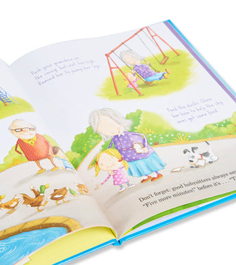 Open pages of How to Babysit a Grandma book with playful illustrations