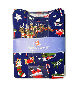 Folded navy pajama set with Christmas print and matching book in packaging