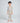 Child wearing Santa Mouse pajamas with allover mouse and holiday print