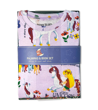 Folded Uni the Unicorn pajama set in packaging, unicorn and girl print visible