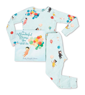 Pale blue pajama set with colorful balloon and child illustrations, paired with The Wonderful Things You Will Be book