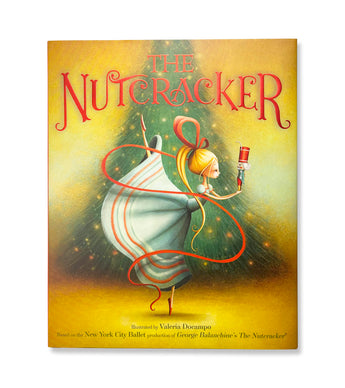The Nutcracker book cover showing a ballerina holding a nutcracker.