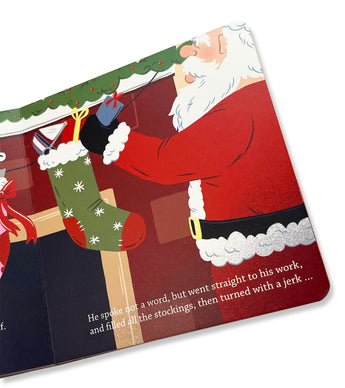 Inside page of 'Twas the Night Before Christmas book with Santa by the fireplace